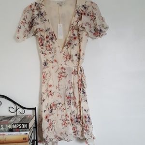 Cream floral wrap dress size small